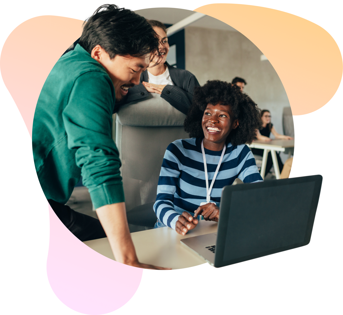 Diverse team members smiling and collaborating in an office.
