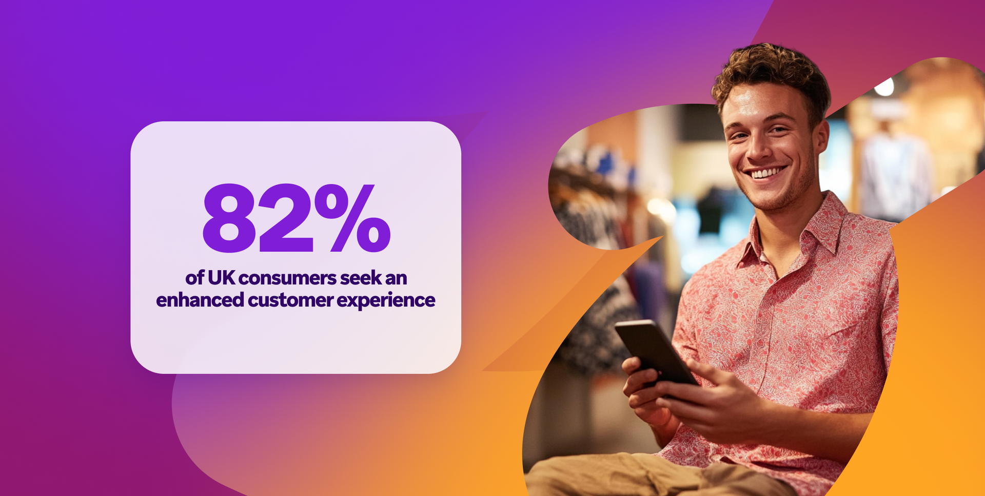 a man is smiling while holding a cell phone in front of a sign that says 82%